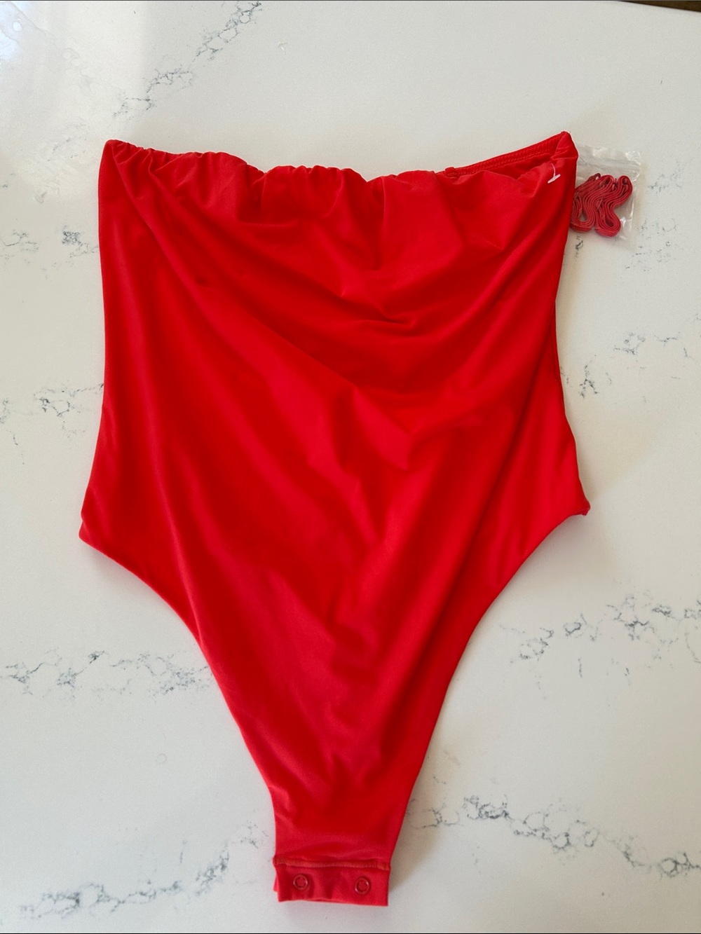 SKIMS Strapless Thong Bodysuit, size Large, Bright Orange/Red, NEW no tag.
